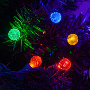 multicolored G12 faceted lights installed in a tree